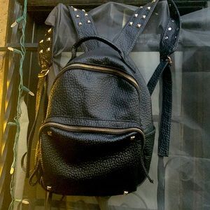 100% authentic leather purse/ backpack